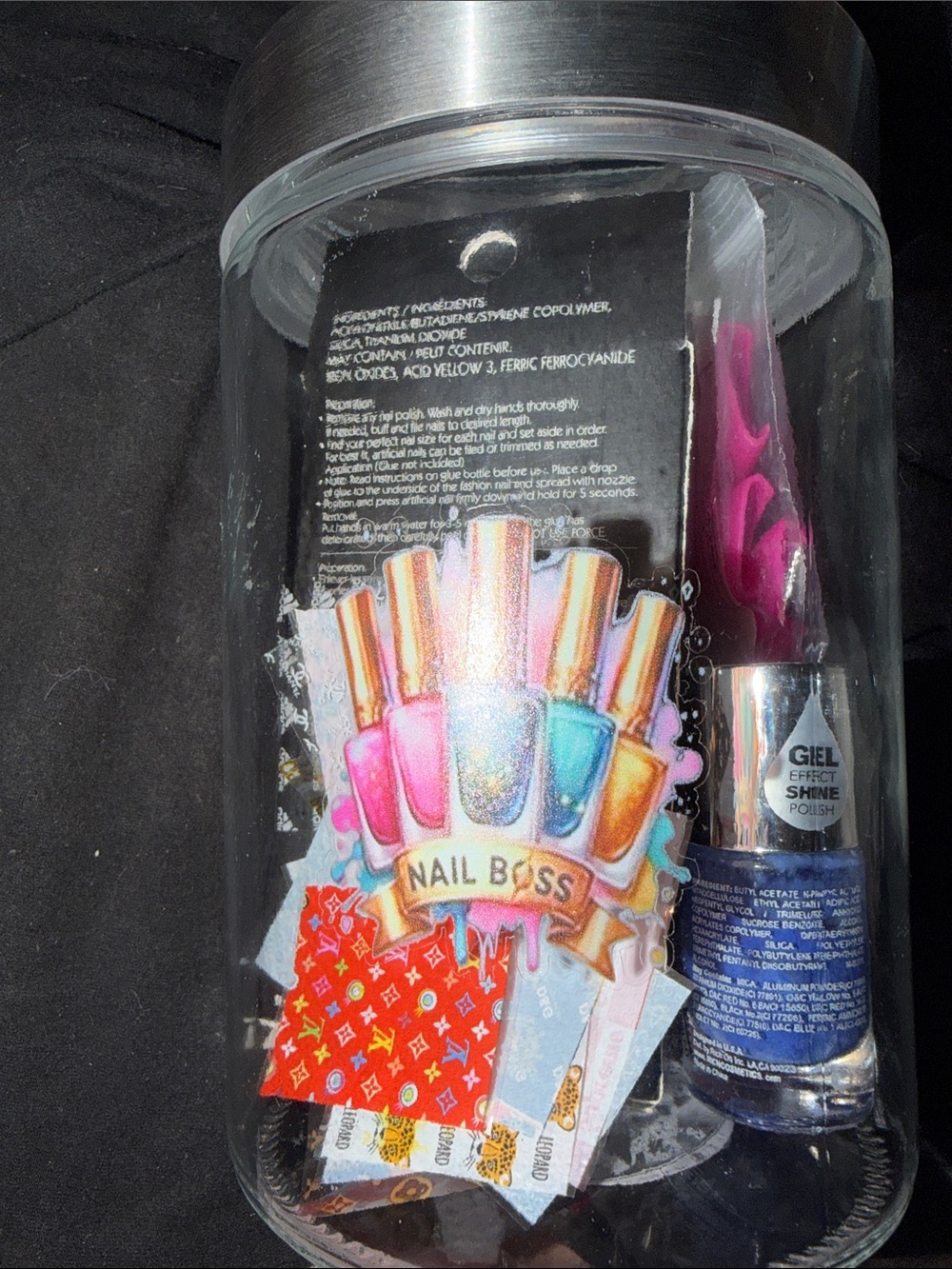 Glass nail boss jar filled